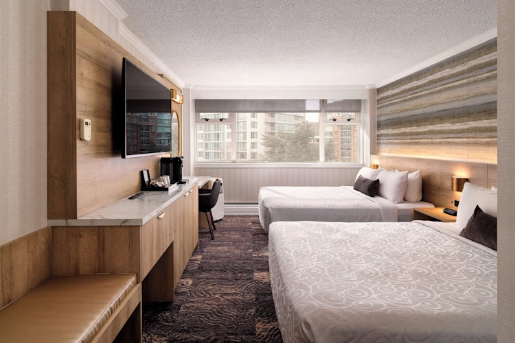 chateau victoria hotel & suites kamer 2 bedden.webp